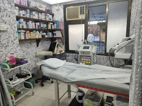 Treatment room with skincare products at Dr. Faraah's Clinic, Goregaon West